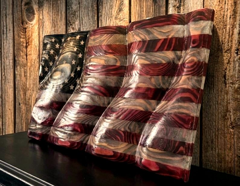 Handcrafted wood American flag showing carved wave relief depth