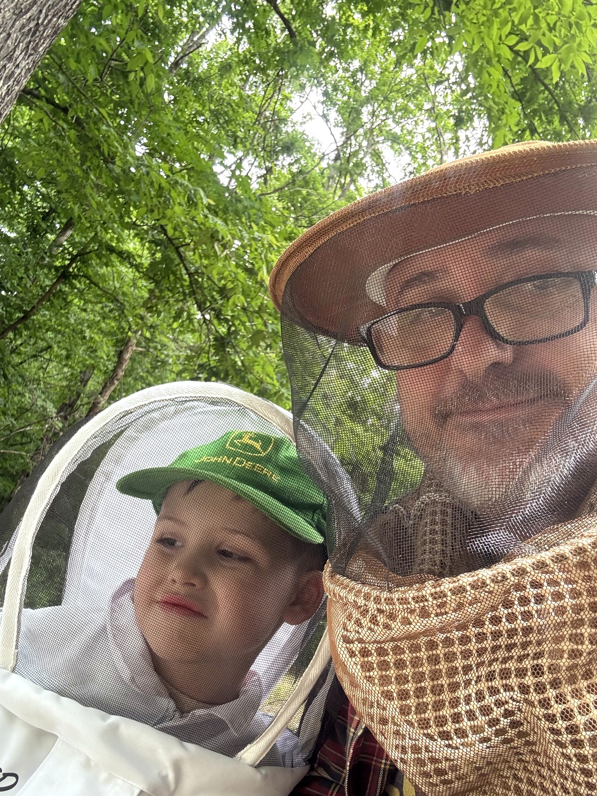 Josh and Sawyer together in veils at the apiary, Cherokee County Alabama